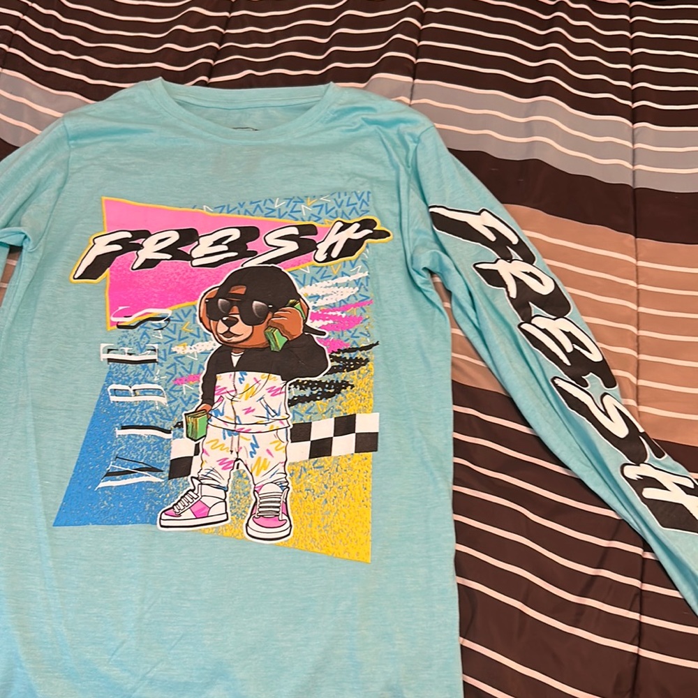 Never worn long sleeve (Fresh vibes) shirt